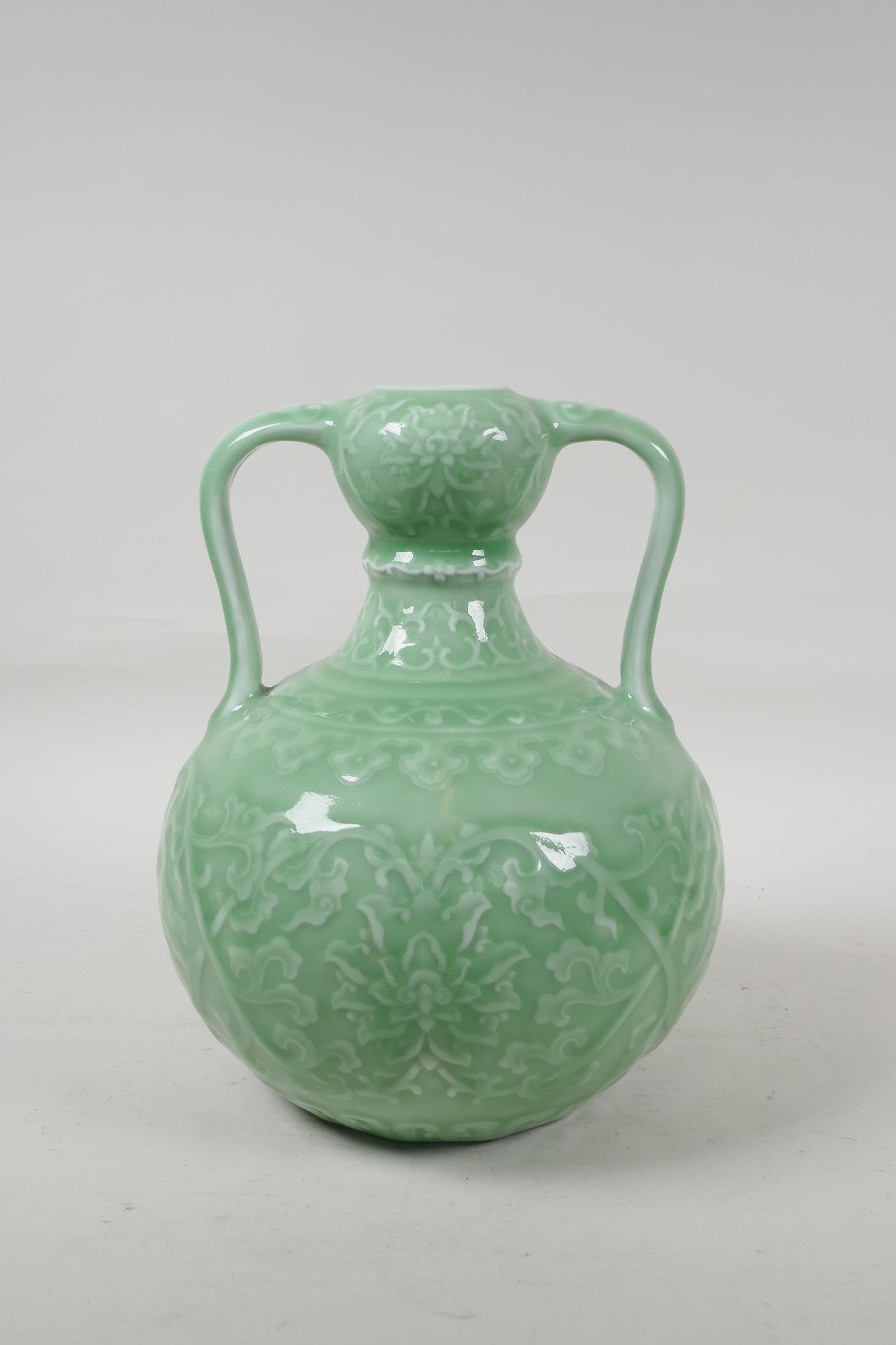 A Chinese green glazed porcelain garlic head vase, with underglaze lotus flower decoration, seal - Image 3 of 5