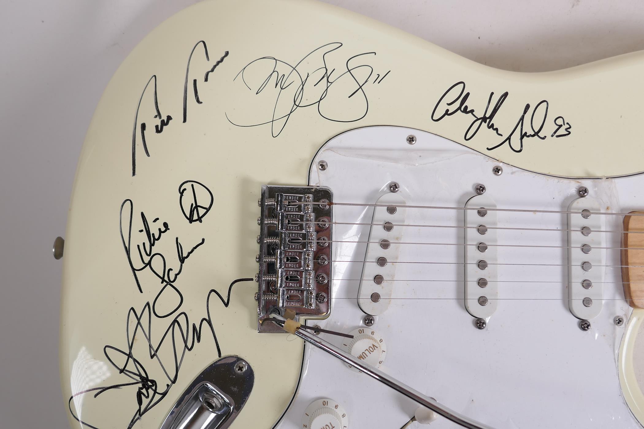 An unused Fender Stratocaster guitar bearing signatures from the band Bon Jovi, 39" long - Image 3 of 6