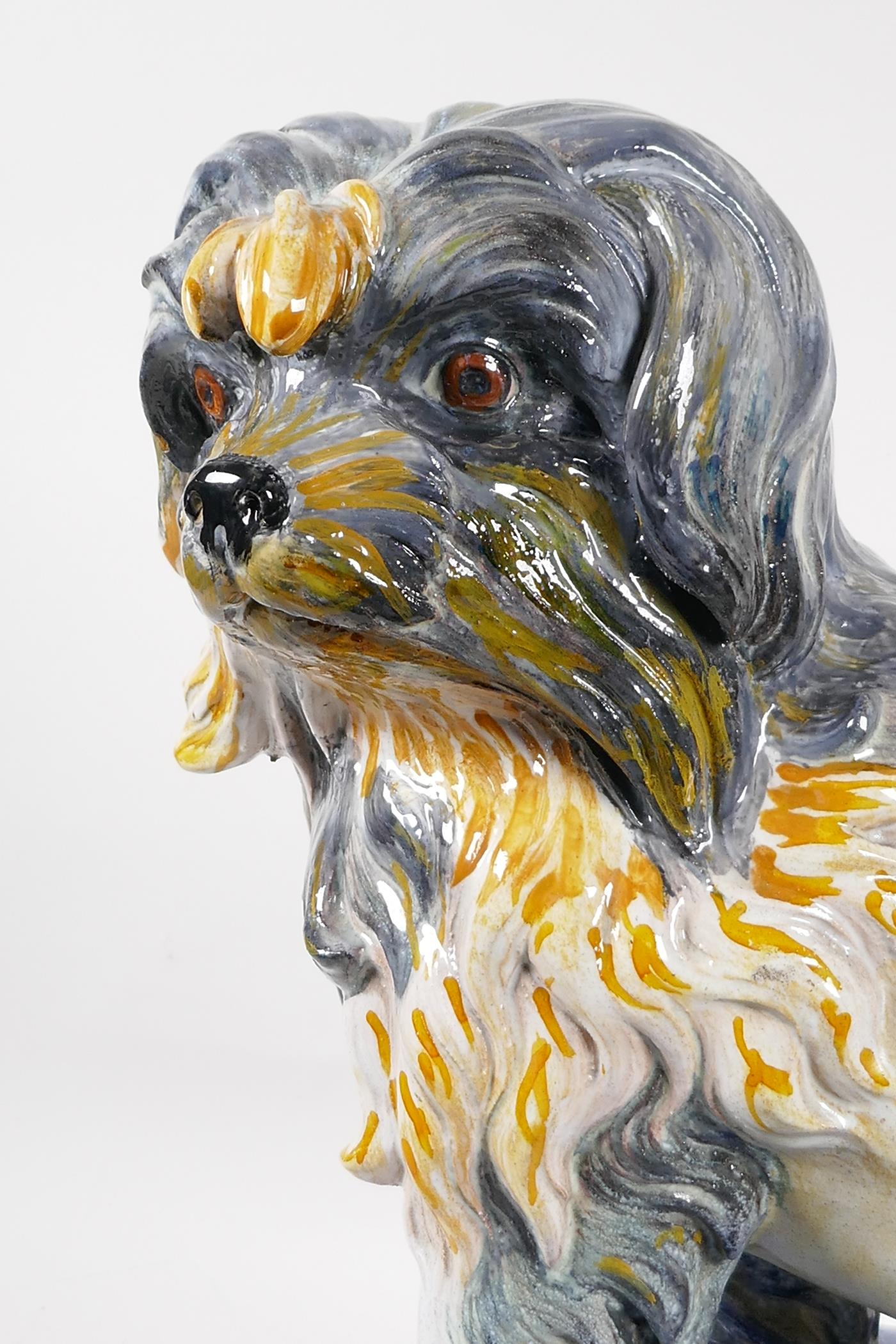 A Majolica pottery dog on a blue pillow, 16" high - Image 2 of 5