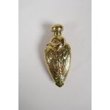 An 18ct gold plated perfume bottle in the form of a bird, 3"