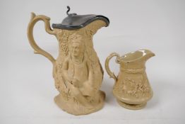 A C19th stoneware jug moulded with figures and fruiting vines, with sandstone matt glaze and
