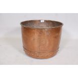 An antique riveted copper log bin, 12" high x 17" diameter