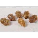 Six animals carved from nuts, 1" long
