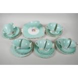 A Foley China eight place setting tea service, with two square section serving plates, cream jug and