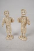 Two oriental carved bone figures, A/F, 6" high