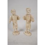 Two oriental carved bone figures, A/F, 6" high