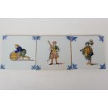 A set of three continental tin glazed tiles with decoration in bright enamels of a musician,