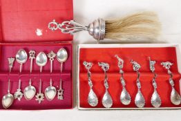 A hallmarked silver handled brush, London 1906, together with a set of six unmarked silver and jewel