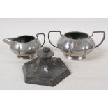 An Arts & Crafts pewter inkwell by Talbot Pewter Co, 4½" wide, together with a Tudric pewter sugar