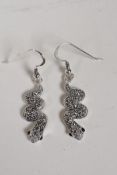 A pair of 925 silver drop earrings in the form of snakes, set with marcasite, 1" drop