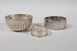 A hallmarked silver Mappin and Webb finger bowl, a hallmarked silver pierced napkin ring (Birmingham