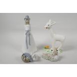 Three Lladro porcelain figurines, Duck with a basket of chicks and two sleeping babies, a Spanish