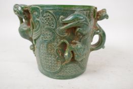 A Chinese green hardstone brush pot with kylin and phoenix handles, 5" high