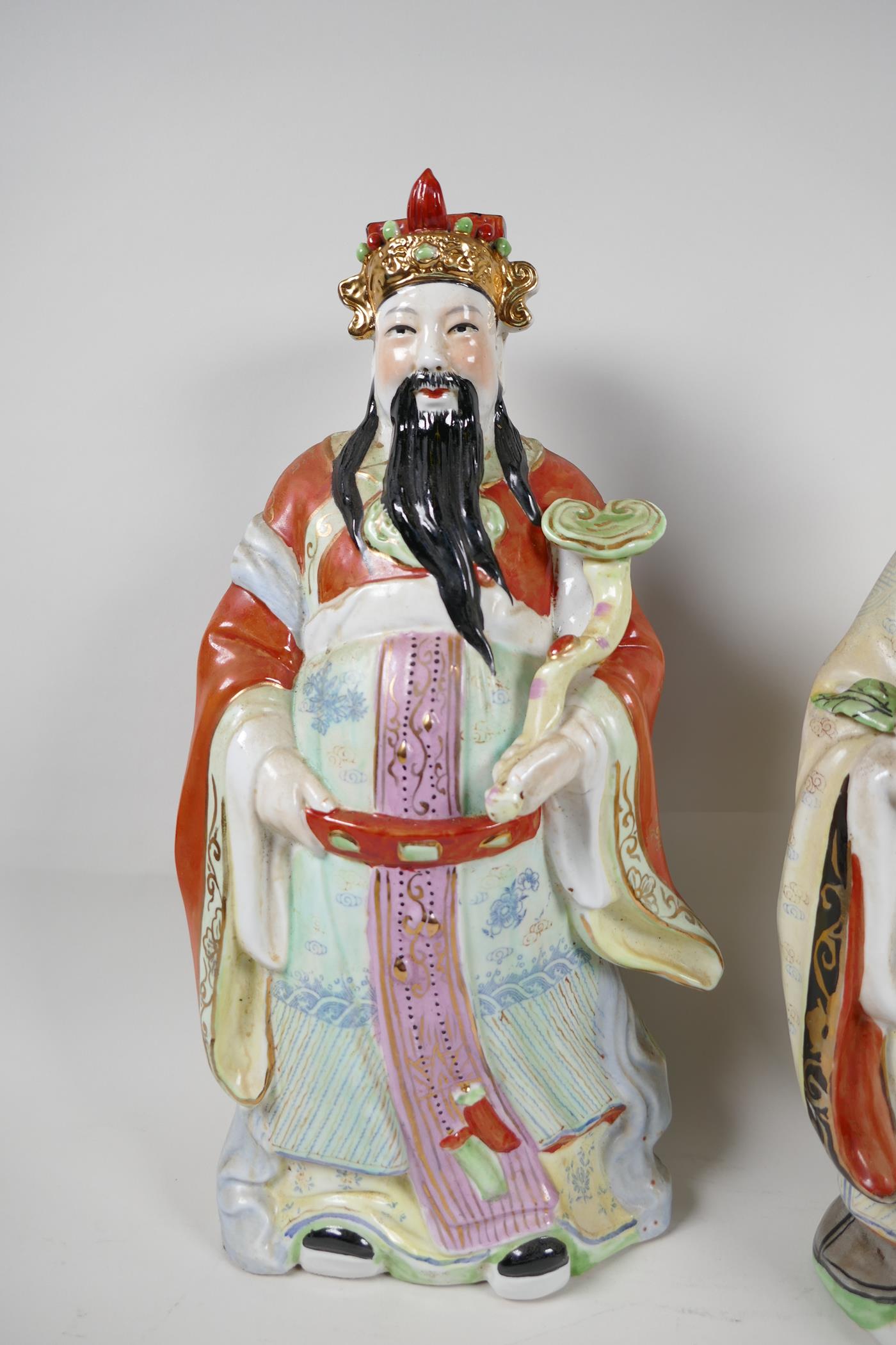 A Chinese porcelain figure of a dignitary with a bejewelled ruyi, painted in bright enamels, 15" - Image 2 of 7