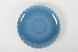 A Chinese blue glazed porcelain flower shaped dish, seal mark to base, 8"