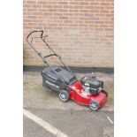 A Mountfield WB45 petrol lawn mower with a 140cl engine, as new