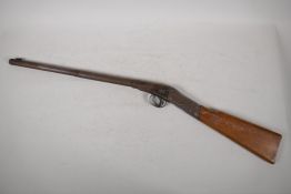 A Milbro Scout air rifle with a break barrel and wooden stock, 30½" long