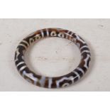 A banded agate bangle, 3" diameter