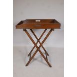 A C19th oak butlers tray on stand, 33" x 27" x 17"