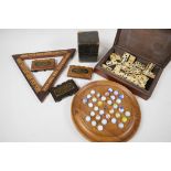 Gaming items: a solitaire board 9" diameter, an early Bezique game, a box of dominoes, a cribbage