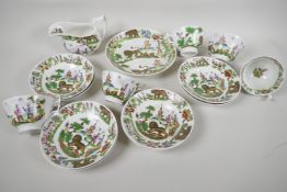 A late C18th/early C19th porcelain part tea service comprising five cups, eight saucers, milk jug