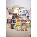 A quantity of vinyl LPs and 12" singles, pop, classical, rock, musicals etc, over 200, to include