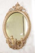 A C19th giltwood and composition girondelle wall mirror with triple sconce, 37" x 23"