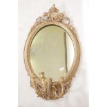 A C19th giltwood and composition girondelle wall mirror with triple sconce, 37" x 23"