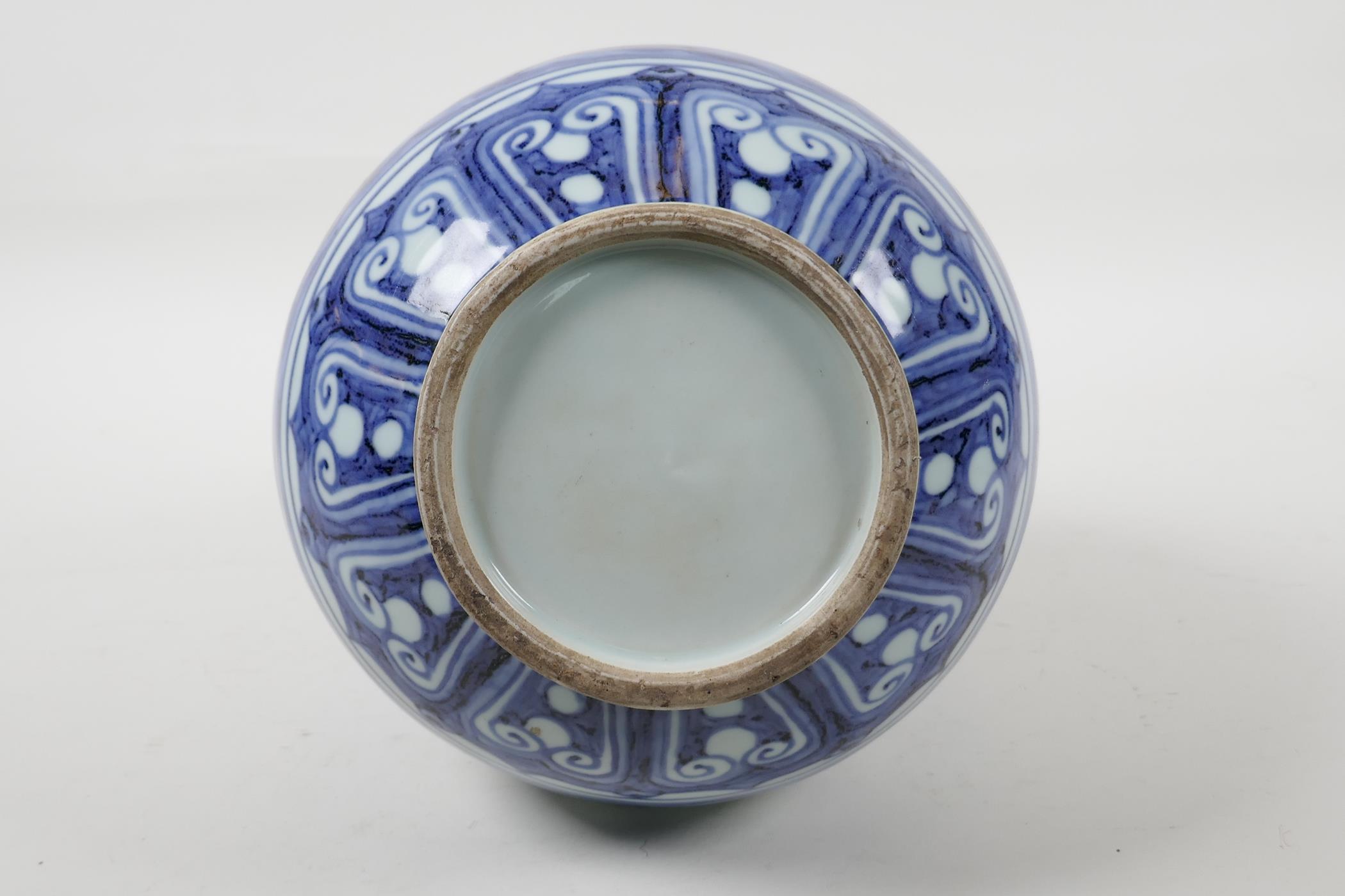 A Ming style blue and white porcelain pear shaped vase decorated with foliage, Chinese six character - Image 6 of 6