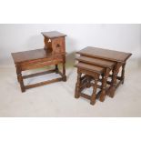 A nest of three oak tables on turned and splayed supports, together with an oak telephone table,