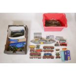 A quantity of Triang & Hornby Dublo gauge rolling stock, track, buildings etc