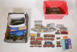 A quantity of Triang & Hornby Dublo gauge rolling stock, track, buildings etc