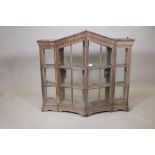 A C19th bleached oak three tier gentleman's curio cabinet, 39" wide, 35" high