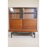 E. Gomme, G Plan mid century mahogany side cabinet with sliding doors and ebonised base, 48" x 18" x