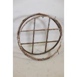 Architectural salvage, a painted metal window frame, 36" diameter