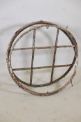 Architectural salvage, a painted metal window frame, 36" diameter