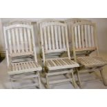 A set of six Heal's teak folding garden chairs