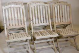 A set of six Heal's teak folding garden chairs