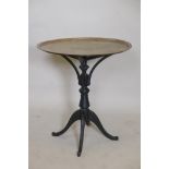 A brass tray top occasional table on ebonised Arts and Crafts pedestal base, 28½" high, 26½"