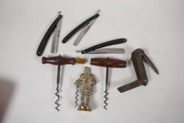 Two antique wood and steel corkscrews, one with brush, 5" long, together with a C19th brass