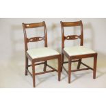 A pair of Regency mahogany pierced bar back side chairs