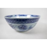 A blue and white punch bowl painted with flowers, birds, fish and characters, Kangxi Chinese mark to