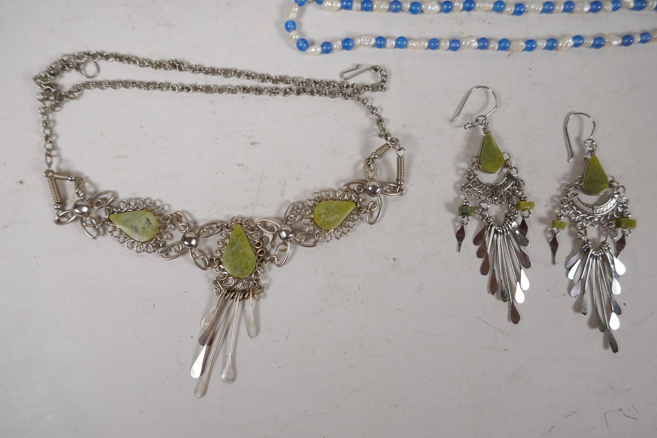 A delicate unmarked silver and green hardstone suite of necklace and earrings, together with a - Image 2 of 5