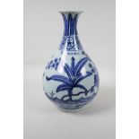 A Ming style blue and white porcelain pear shaped vase decorated with foliage, Chinese six character