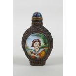 A Chinese repousse copper snuff bottle with two enamelled decorative panels depicting European