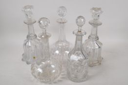 Five C19th glass decanters, 11" high