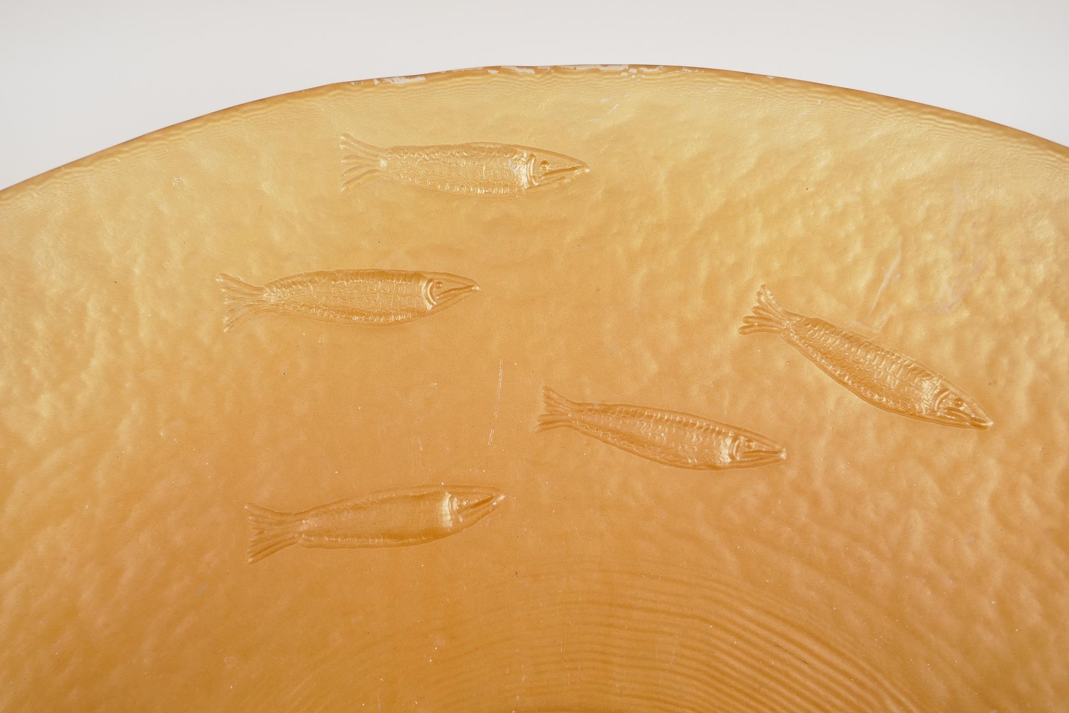 A large amber glass centrepiece bowl, embossed with a shoal of fish, 19" diameter - Image 3 of 4