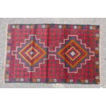 Full pile red ground Afghan Belouch nomadic rug, 35" x 56"