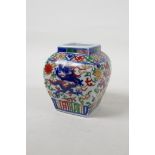 A Wucai porcelain jar with dragon and lotus flower decoration, Chinese six character mark to base,