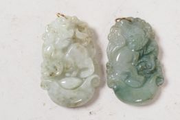A jade pendant carved with kylin, 1" long, together with another carved with a monkey
